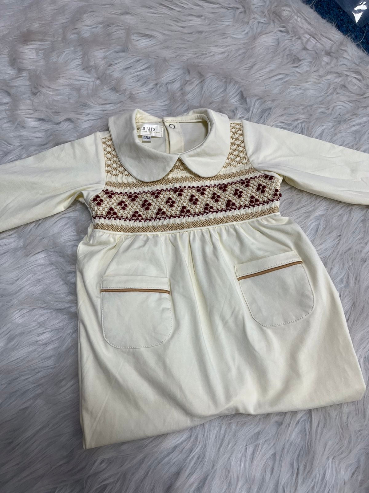 Boys smocked baby grow