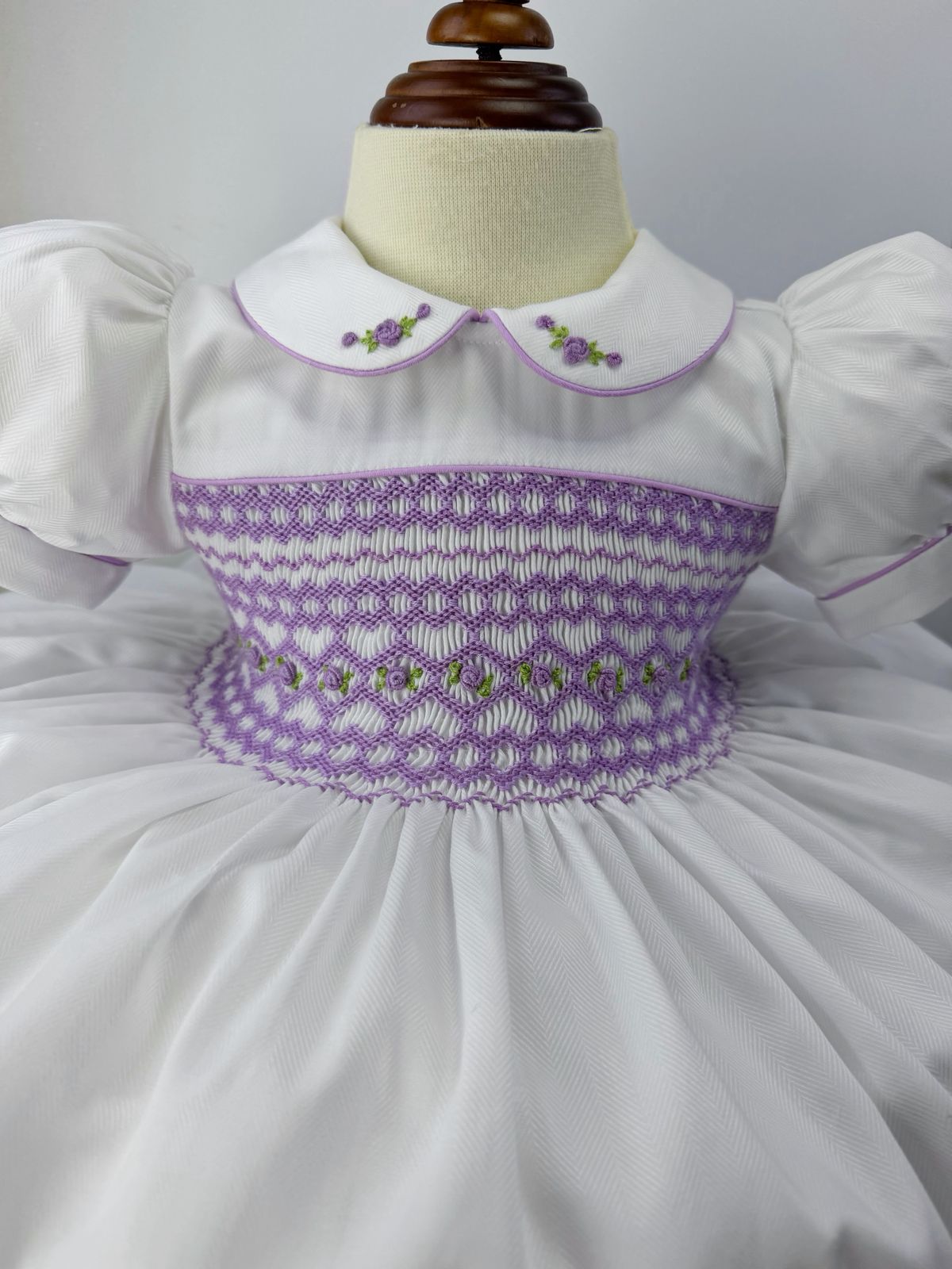 White dress with lilac smocking