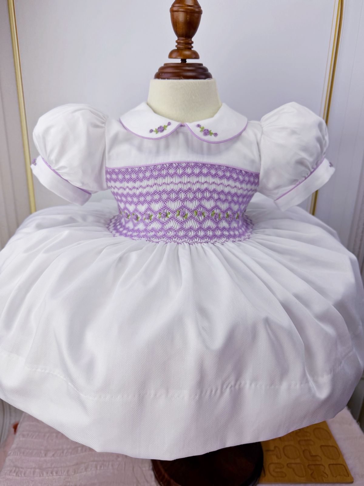 White dress with lilac smocking